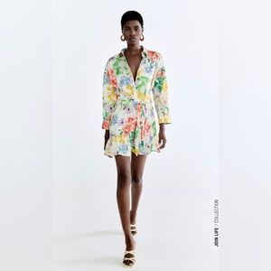 Printed mini dress with lapel collar and belt